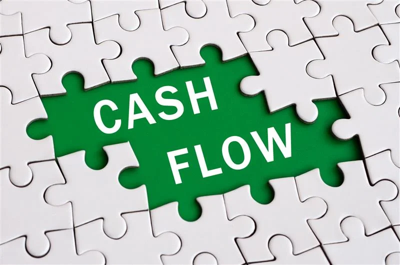 Cash flow management concept with green puzzle piece